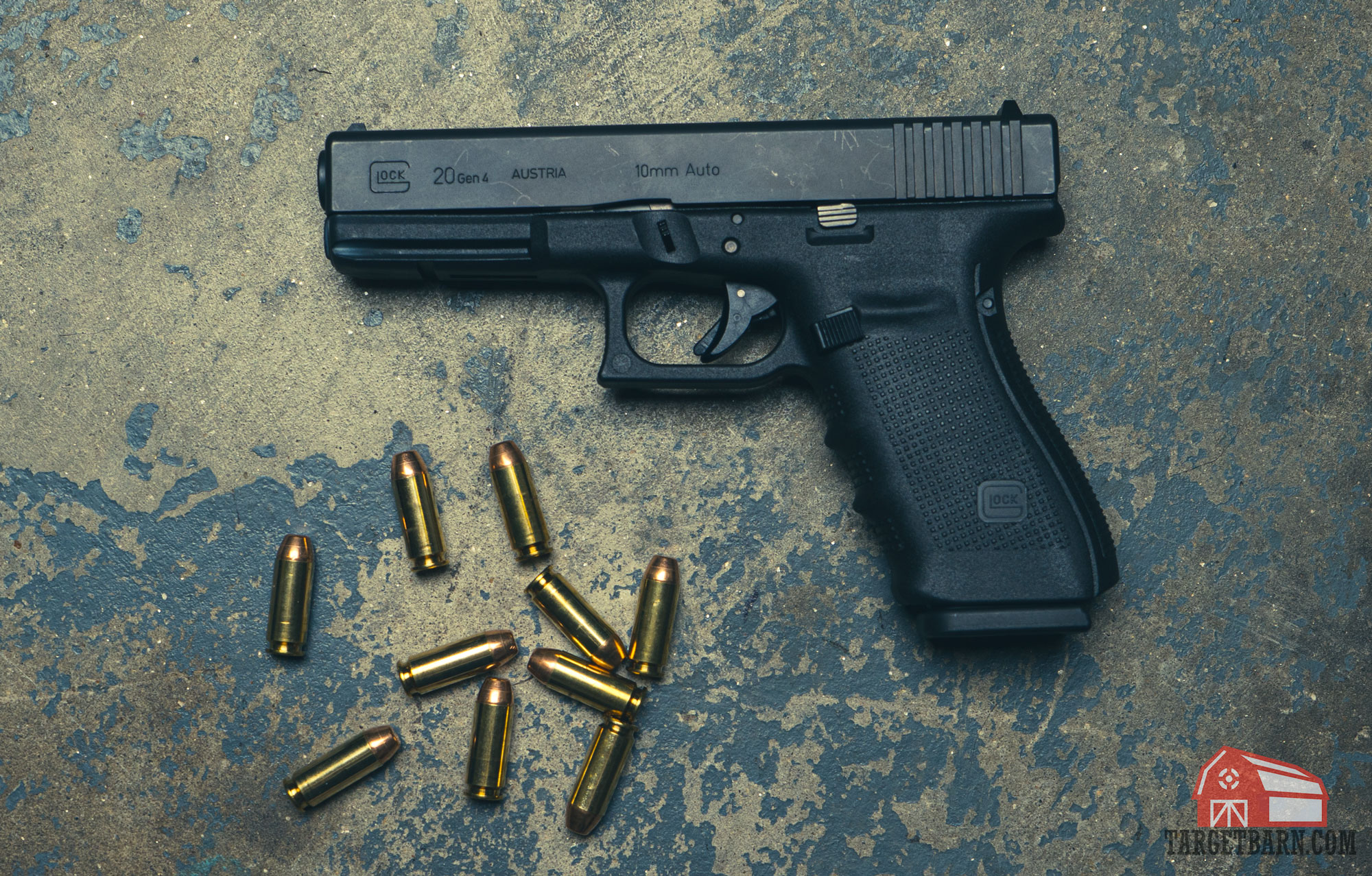 a 10mm glock 20 gen 4 next to ten 10mm rounds
