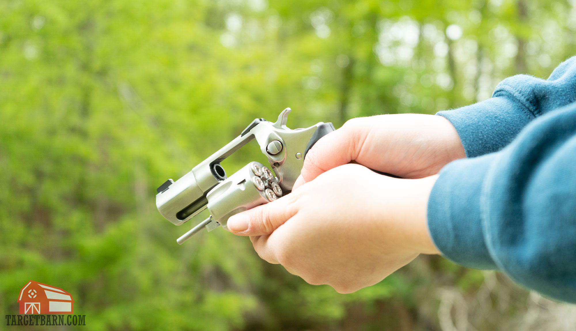 a .357 magnum revolver cylinder being held open at the range