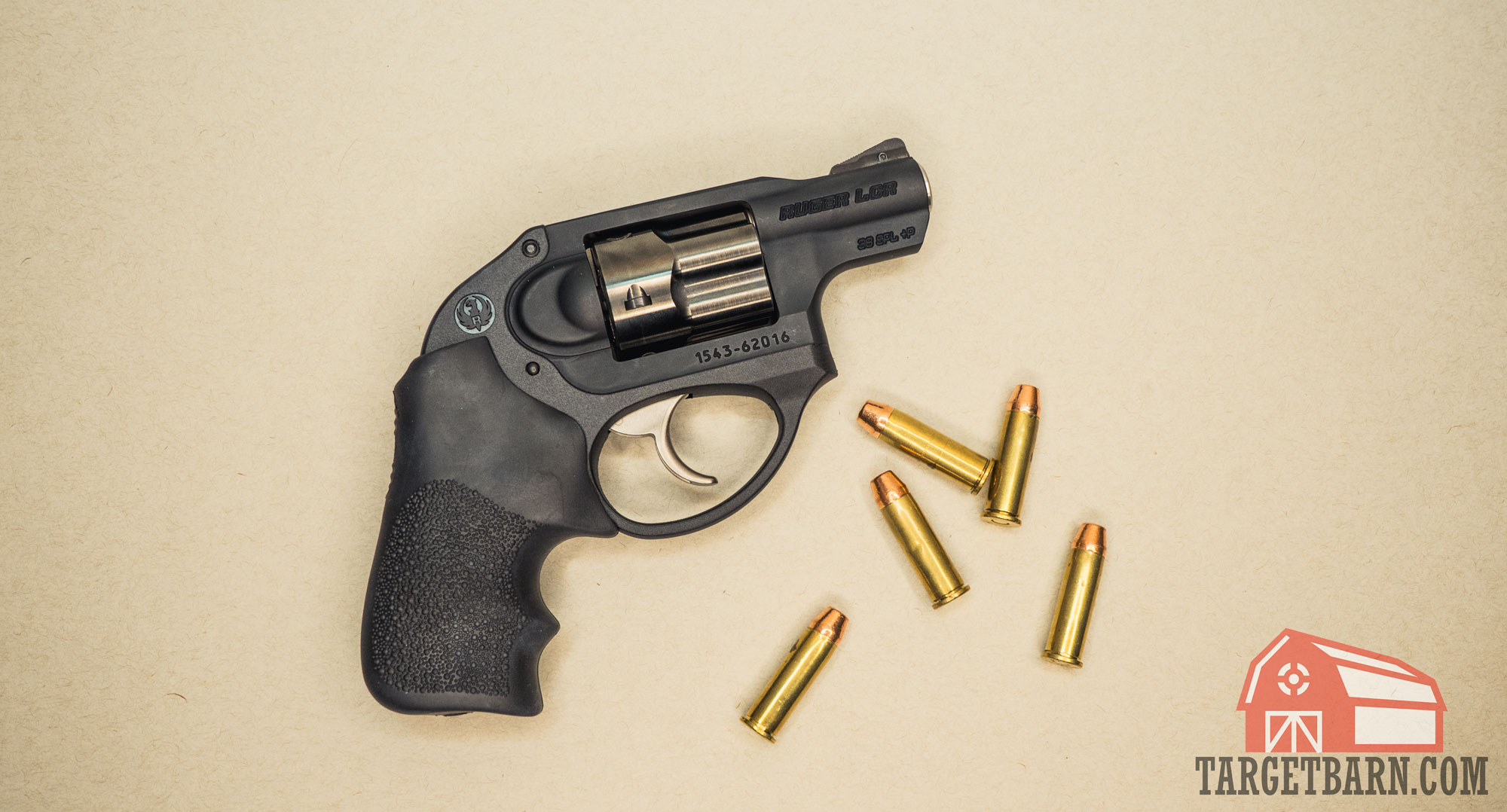 a ruger lcr 38 special +P snubby revolver next to 38 special rounds