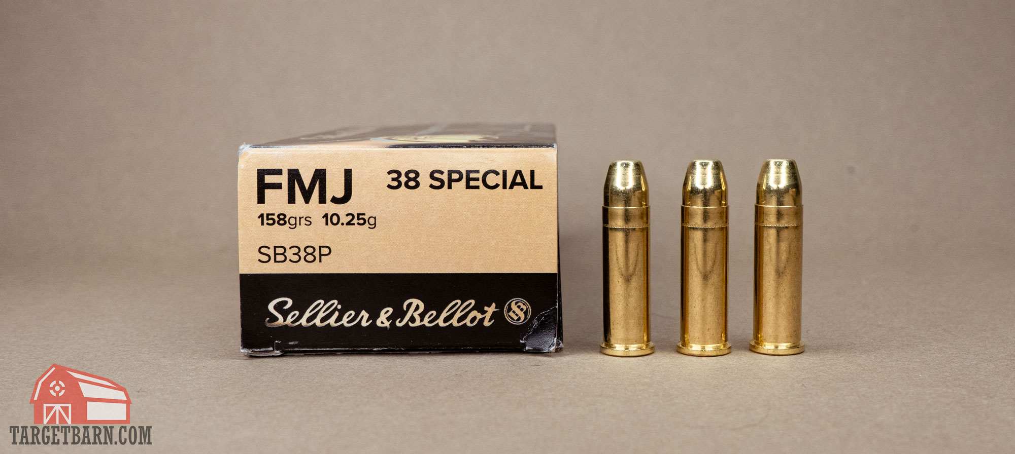 a box and three rounds of sellier & bellot .38 special ammo