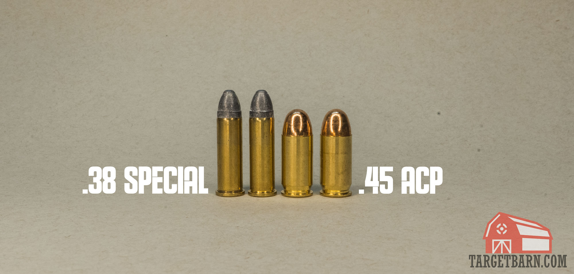 two 38 special rounds next to two 45 acp rounds