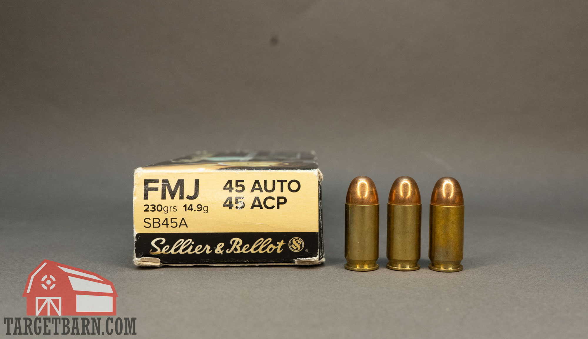 a box and three rounds of .45 acp ammo