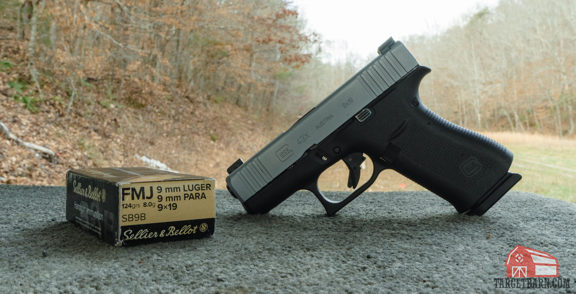 a box of sellier & bellot 124 grain ammo and a glock 43x at the range