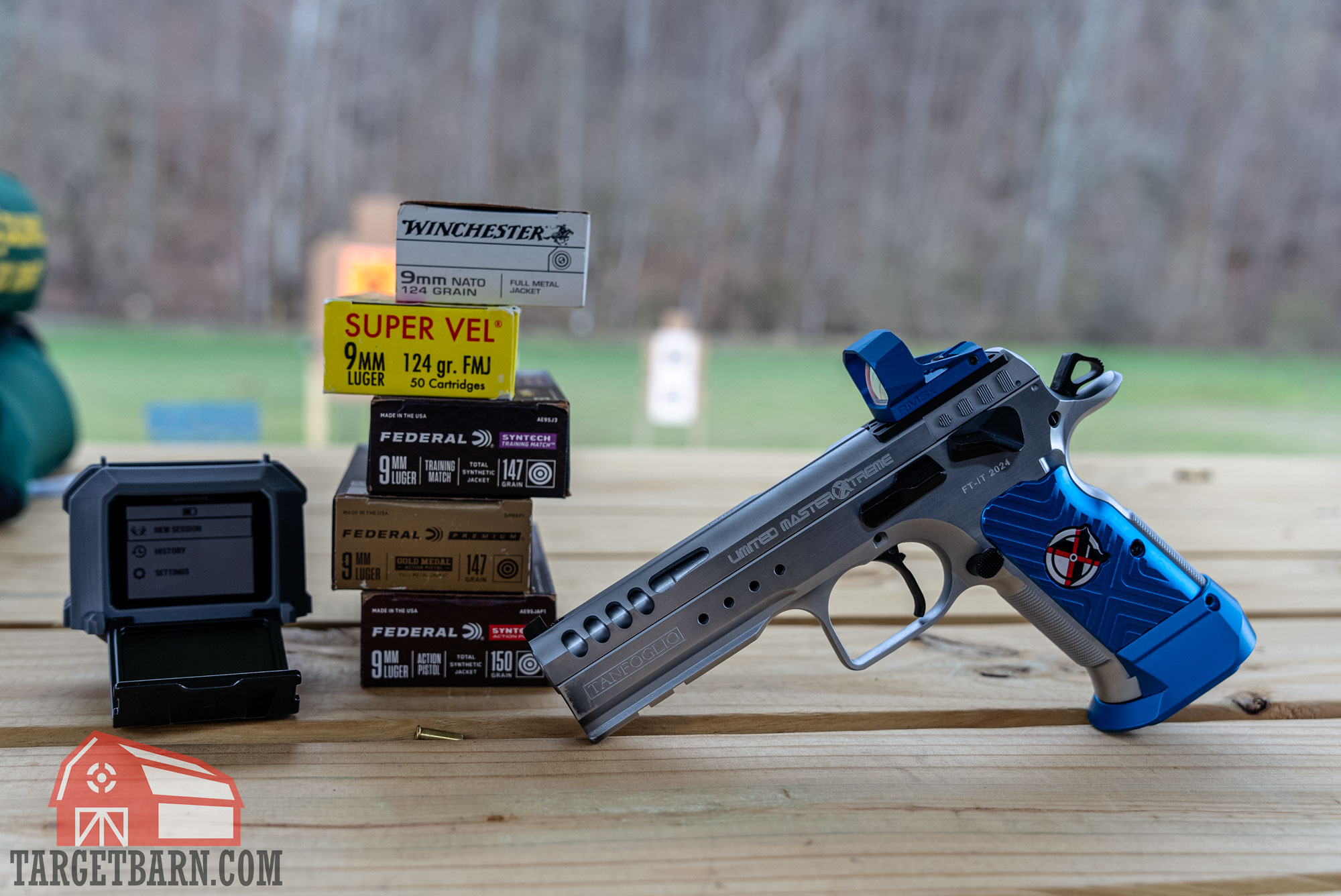 9mm match grade ammo a tanfoglio competition pistol, 5 boxes of 9mm ammo, and a chronograph
