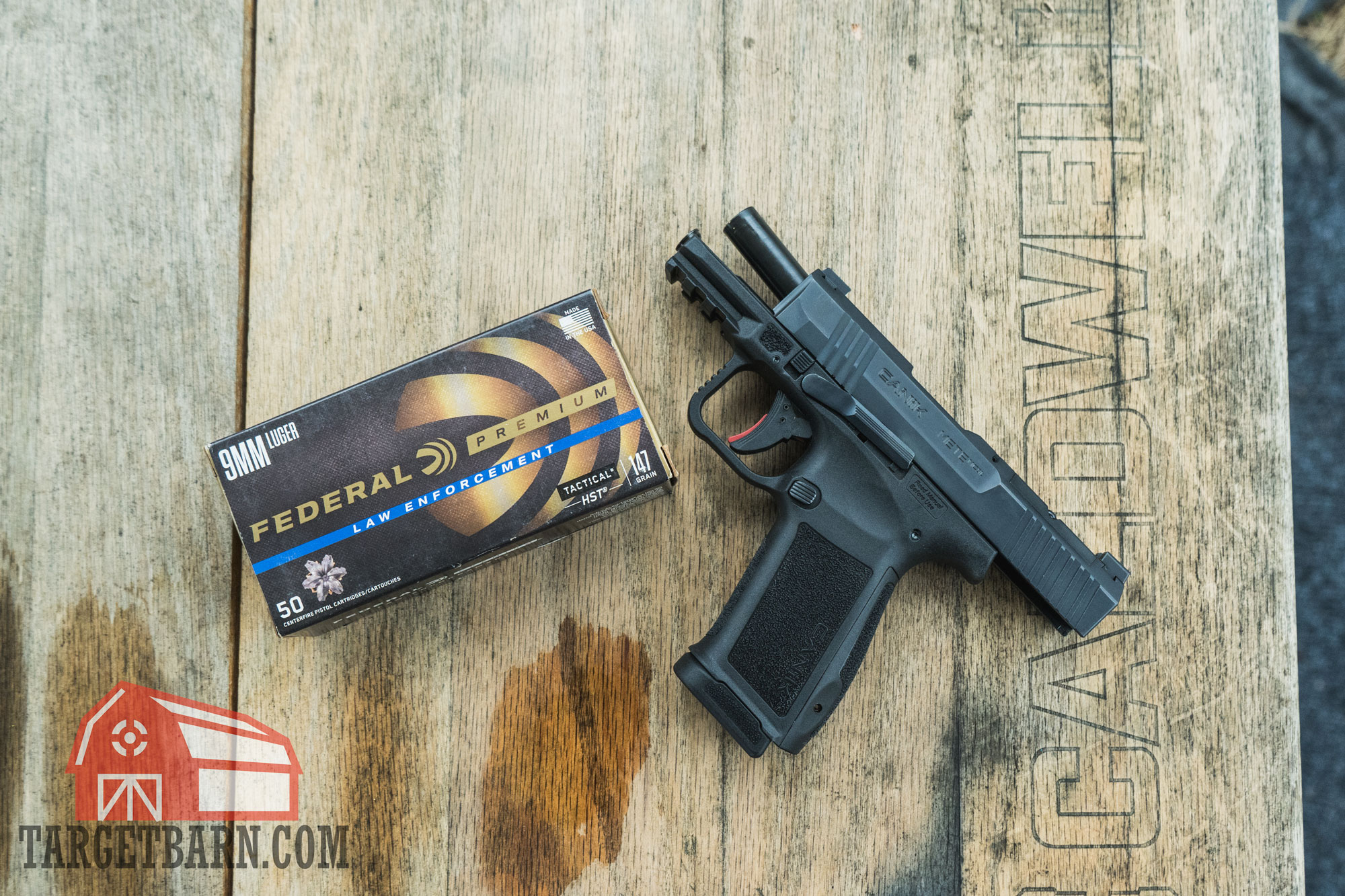 canik pistol a box of federal premium 9mm 147gr. hst with a canik pistol