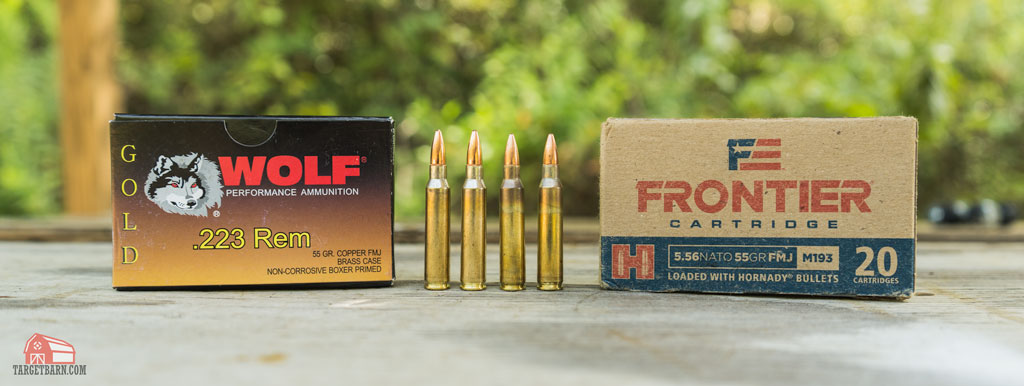 a box and rounds of wolf gold 223 next to a box and rounds of frontier 556x45 ammo