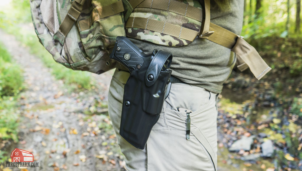 a safariland als retention holster like this one is a good option for backpacking