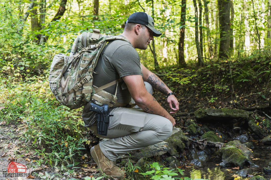 stopping by a stream while backpacking with a gun in a safariland holster