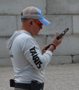 Caleb loading pistol before running a stage
