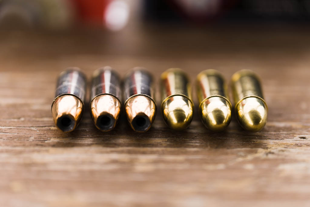 three 9mm JHP's next to three 9mm FMJ's