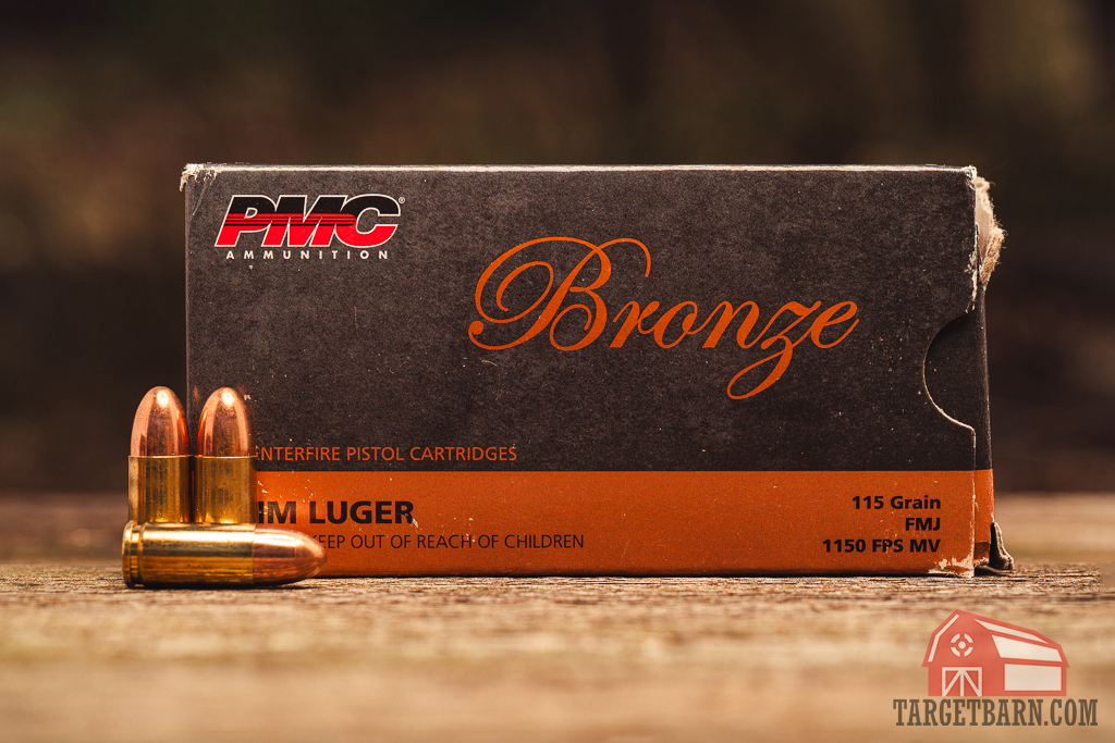 PMC Bronze 9mm ammo on display at a shooting range