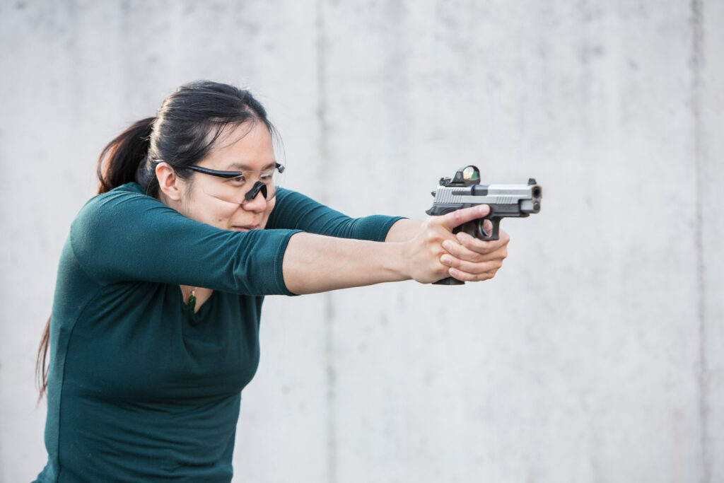 Demonstrating the tactical turtle shooting position for recoil management