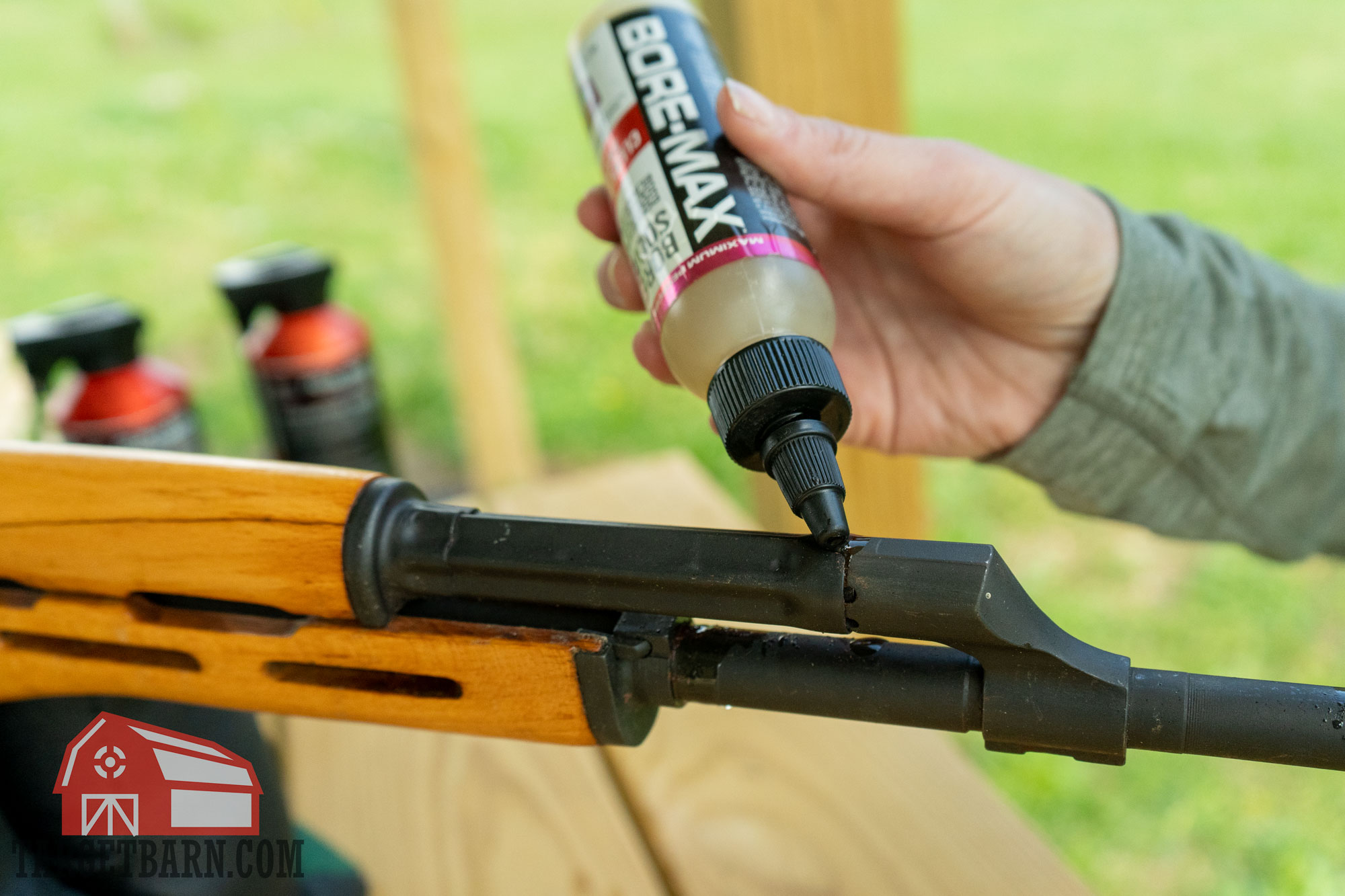 applying bore solvent to rifle barrel