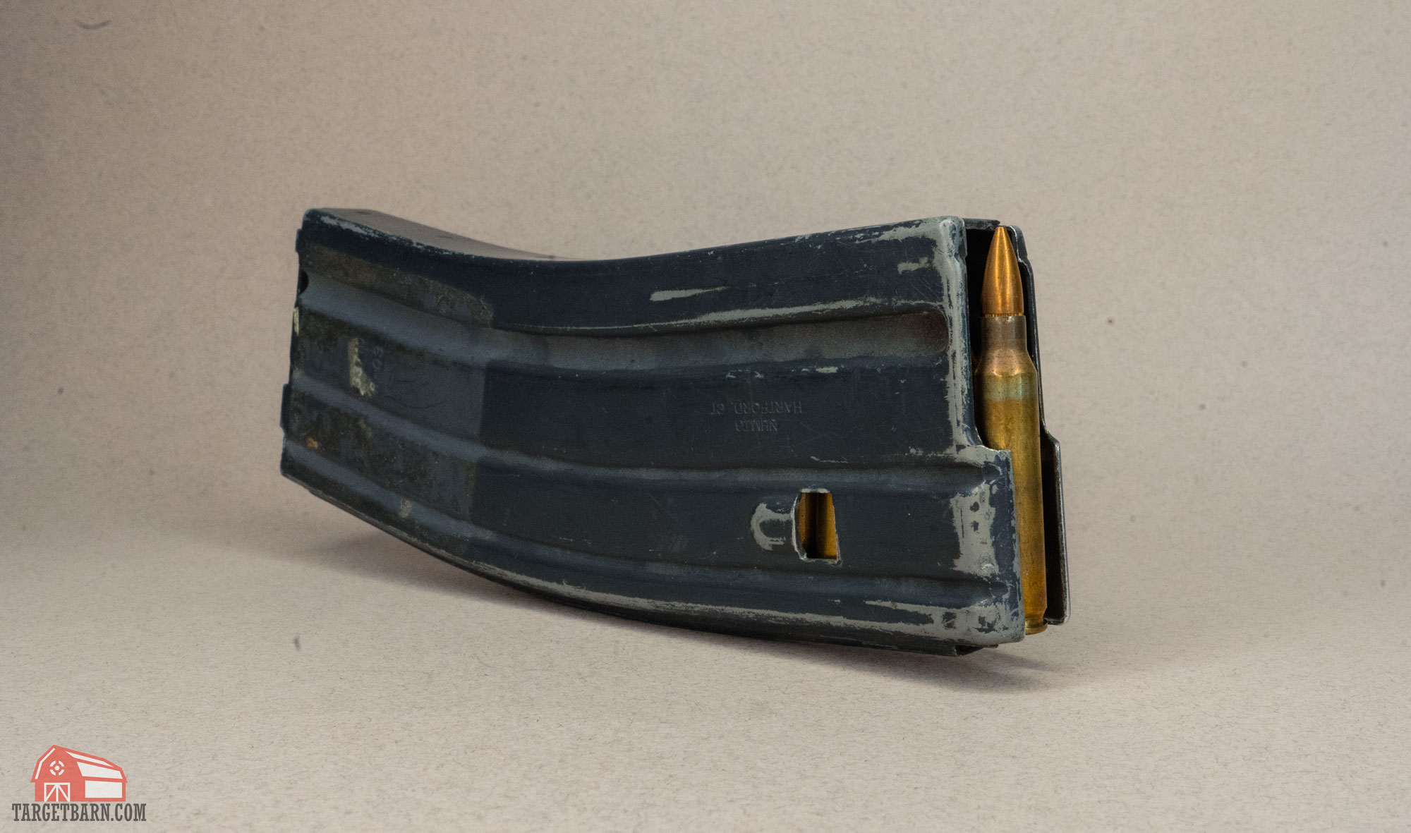 an ar-15 box magazine loaded with 223 ammo