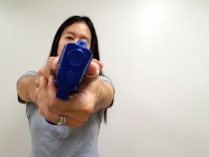 Pistol held canted diagonally
