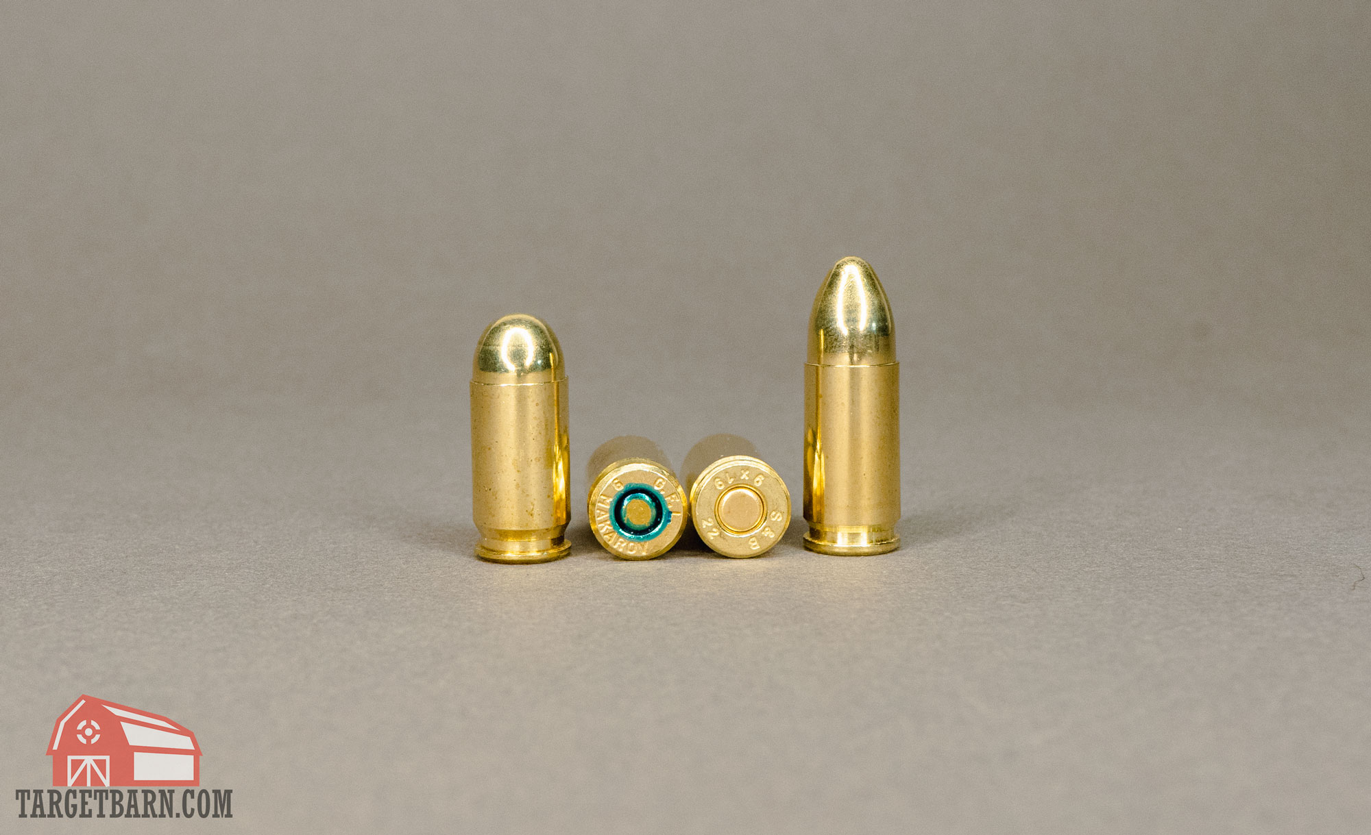 two rounds of 9mm makarov next to two rounds of 9mm luger to show difference in cartridge size