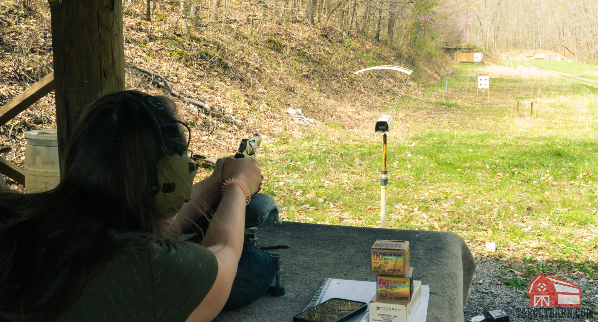 the author shooting .38 special ammo through a chronograph to measure velocity