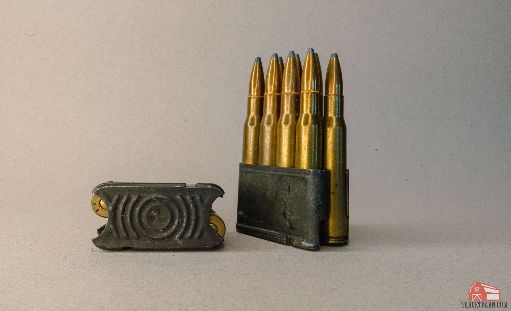 two en bloc clips holding .30-06 ammo for the m1 garand rifle