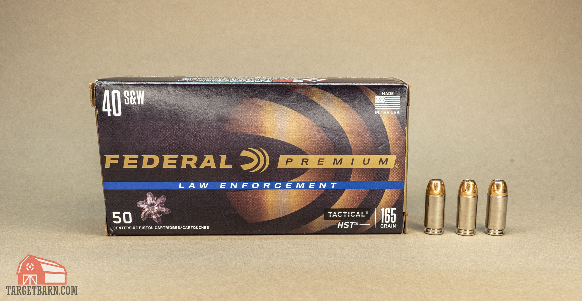a box and three rounds of federal law enforcement tactical hst .40 S&W 165gr. ammo