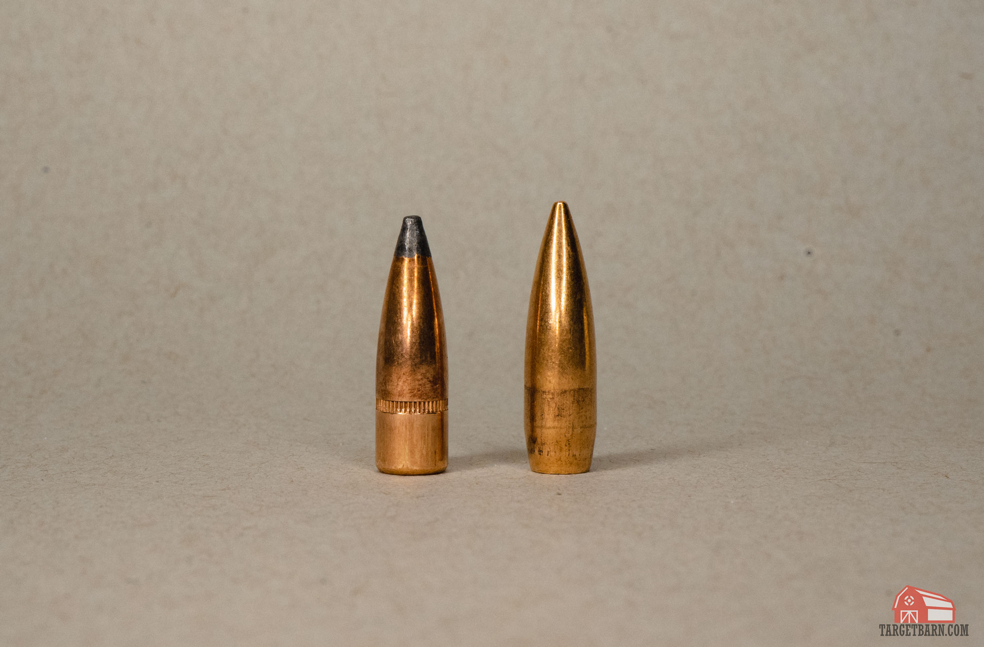 a flat base bullet on the left and a boat tail bullet on the right