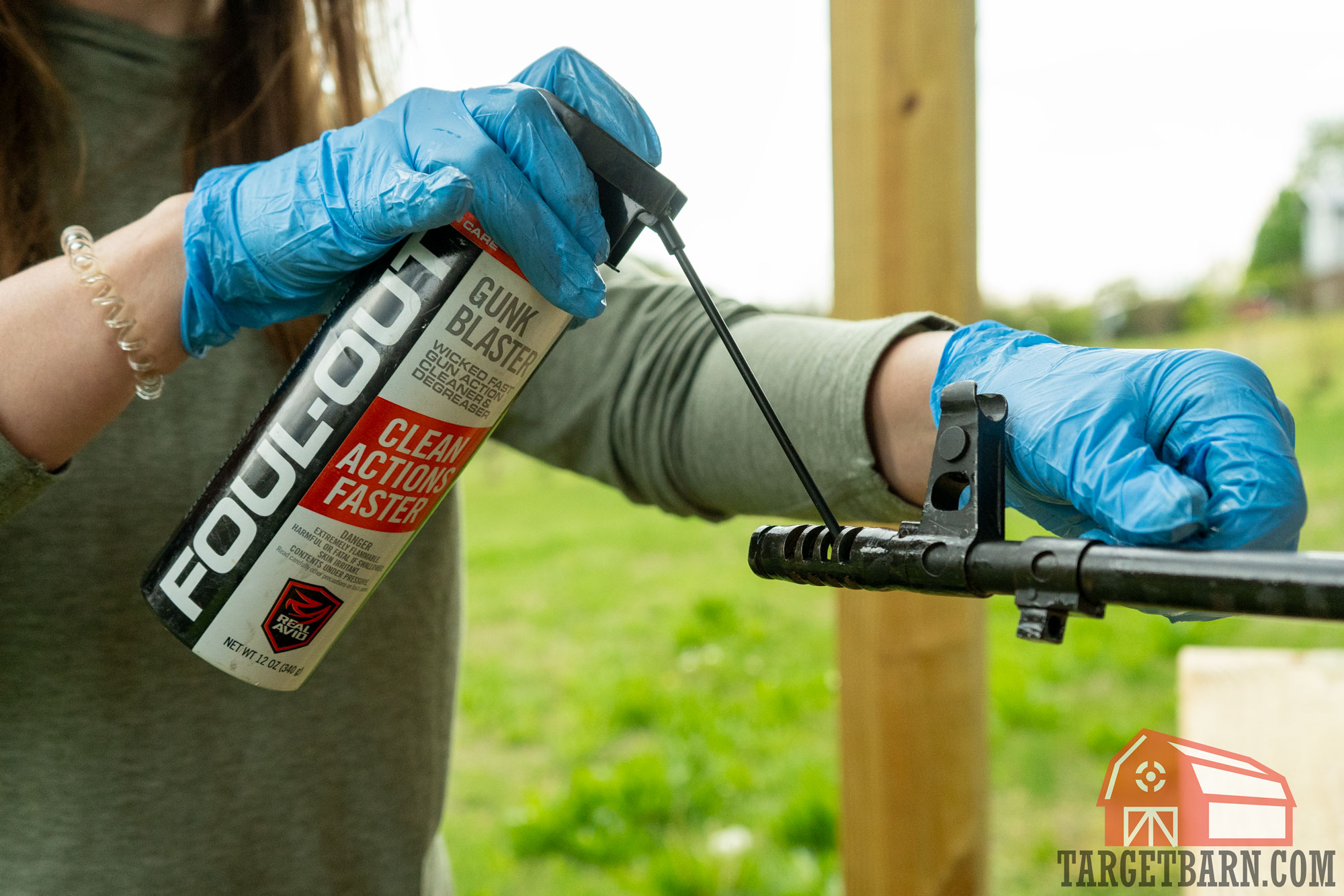 applying acetone gunk blaster to remove loose build up
