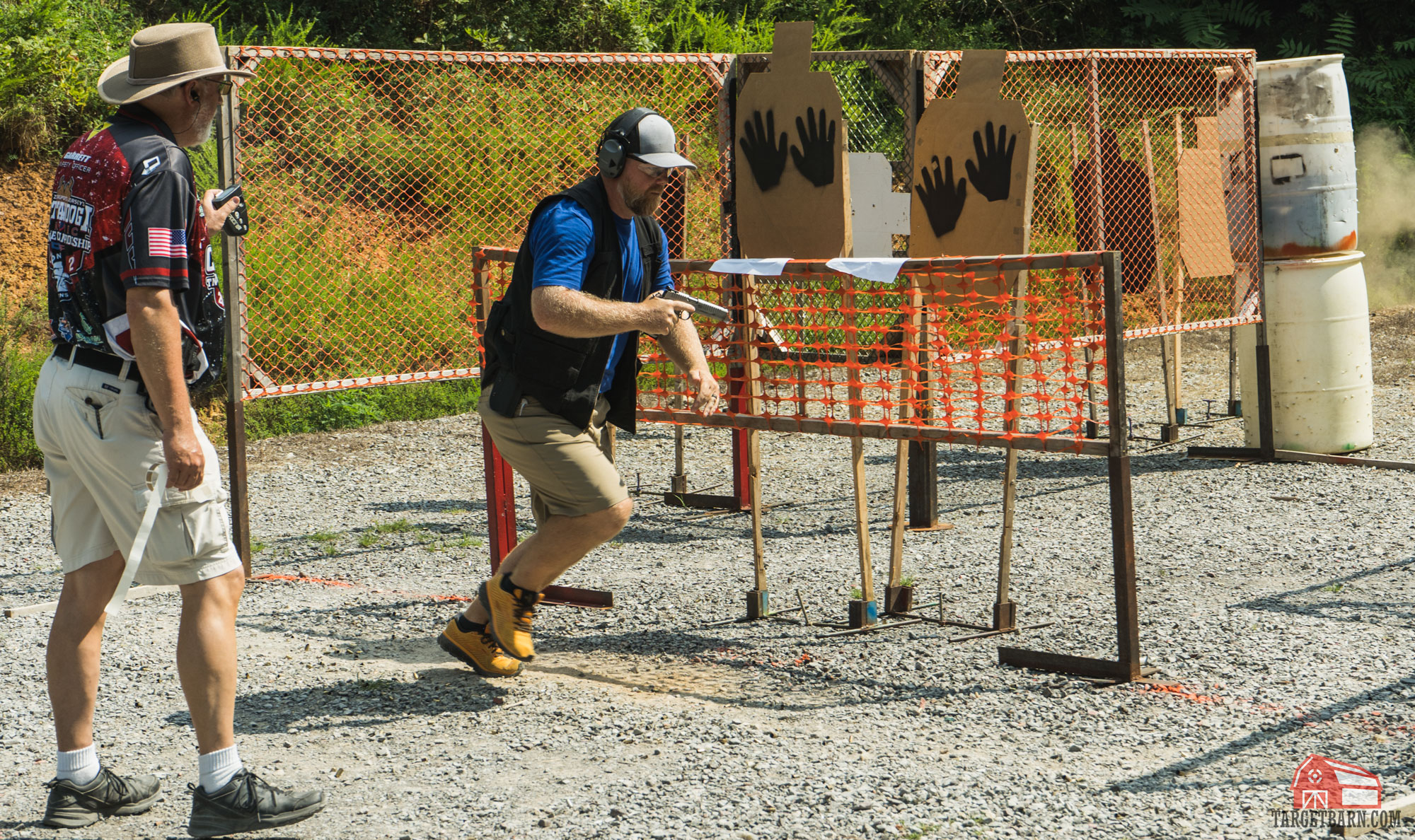 an idpa shooter shooting a stage