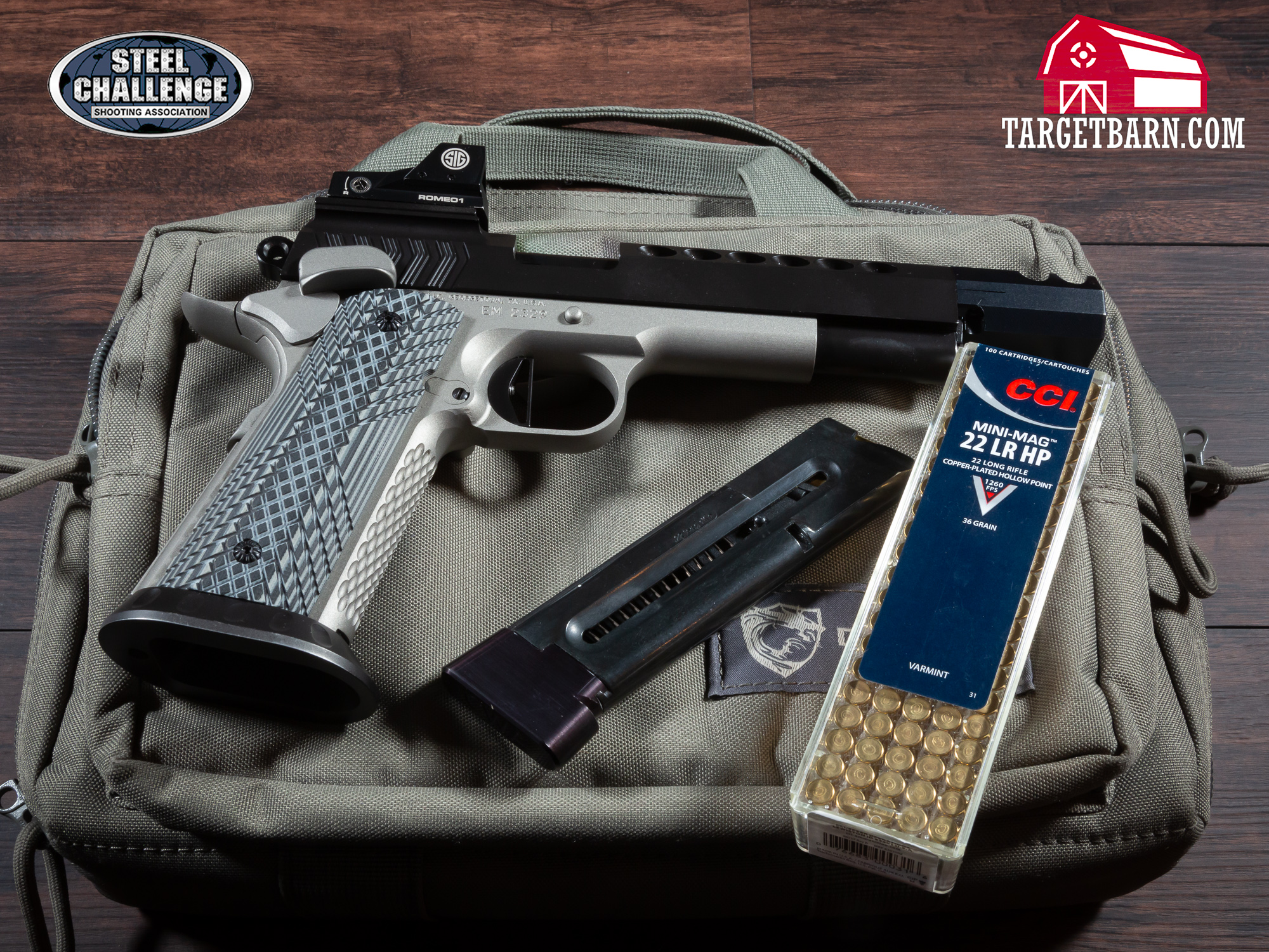 a rimfire pistol, magazine, and ammo for steel challenge