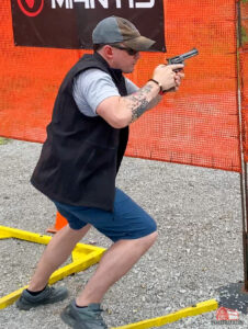 caleb shooting the manurhin in an idpa match