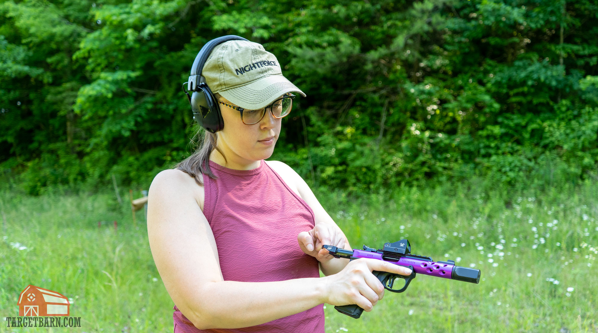 the author using the halo charging ring on an upgraded ruger mark iv 22/45 lite