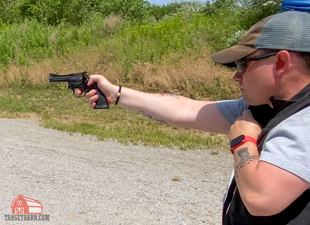caleb shooting the manurhin mr73 revolver one-handed