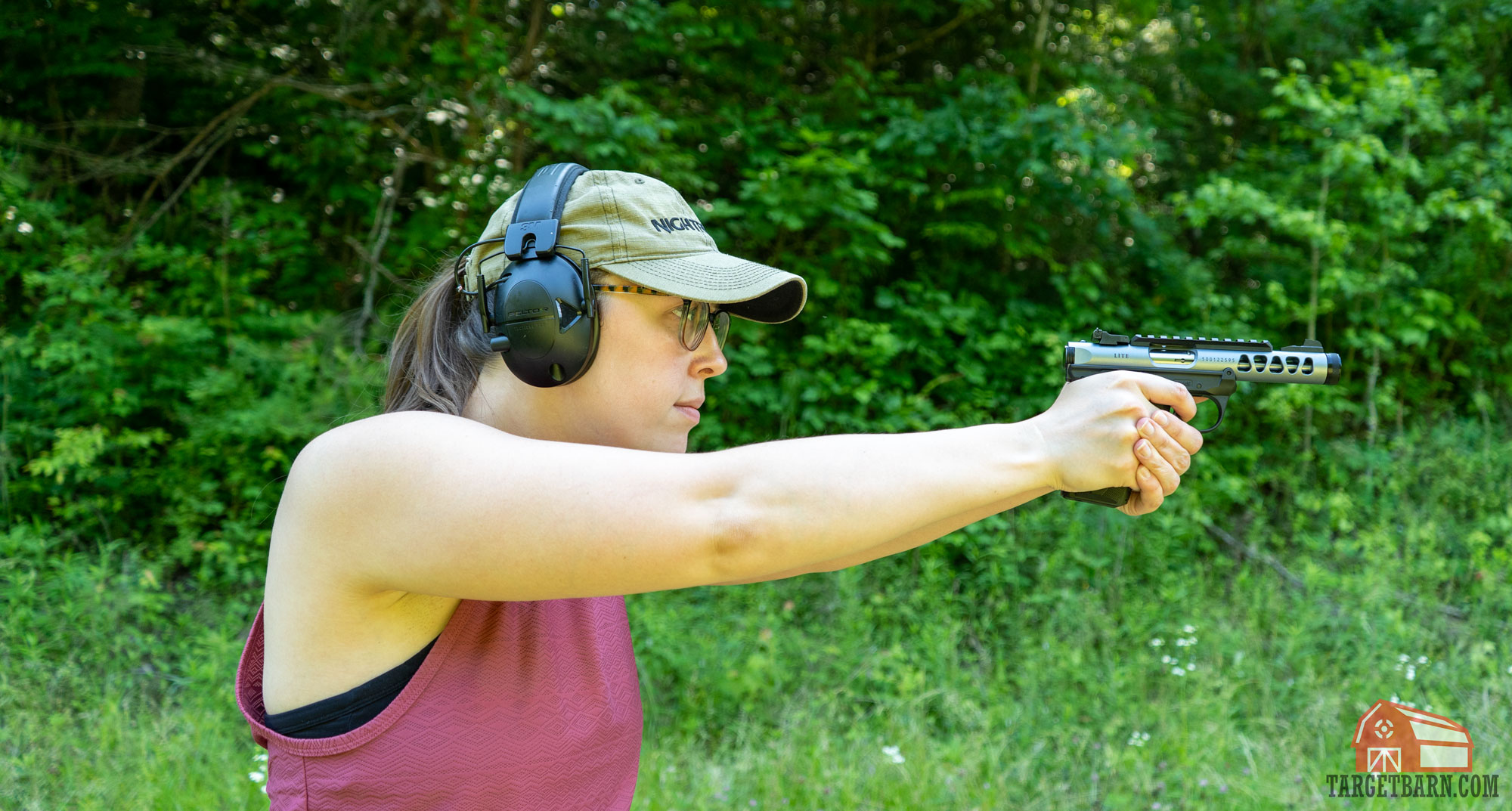 the author plinking with a ruger mark iv 22/45 lite .22lr pistol at the range