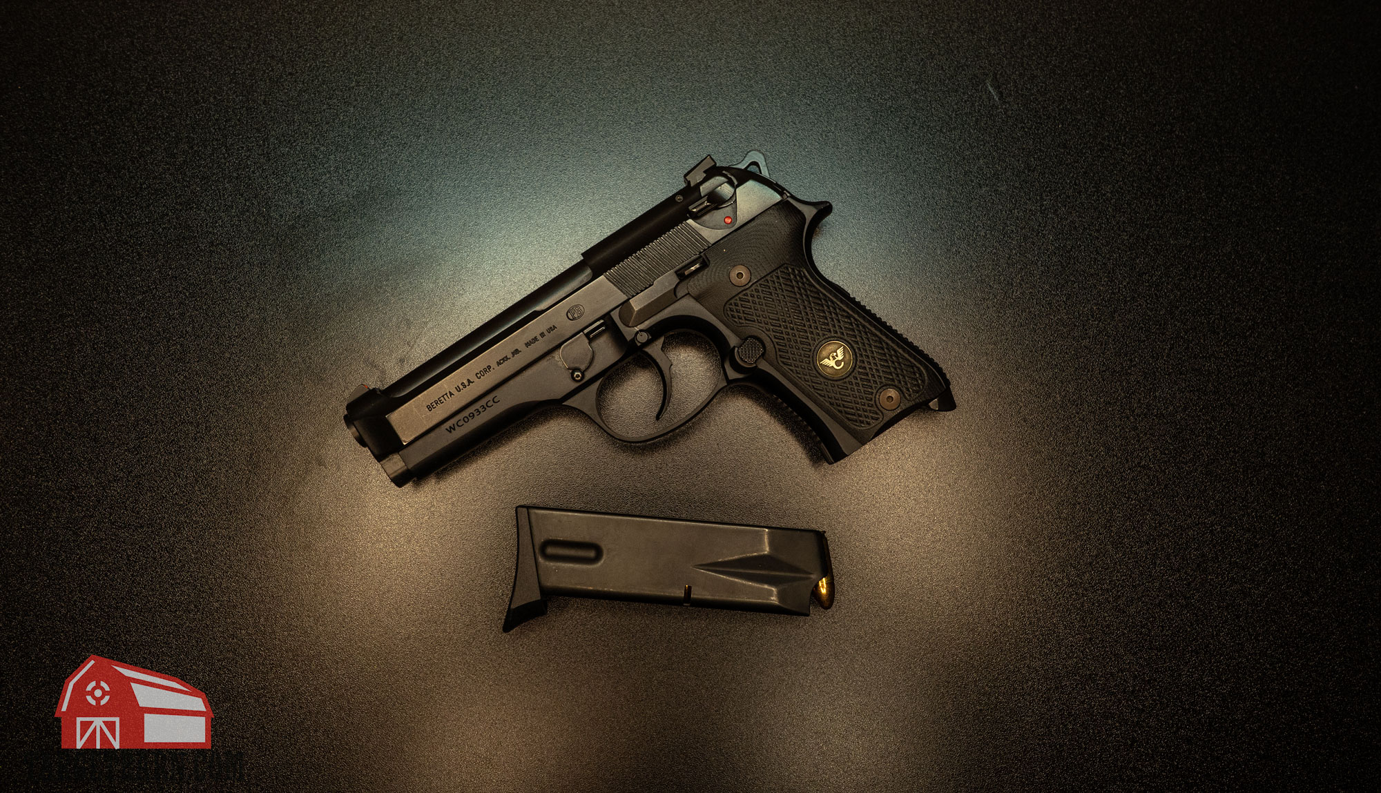 a beretta pistol with a magazine loaded with ball ammo