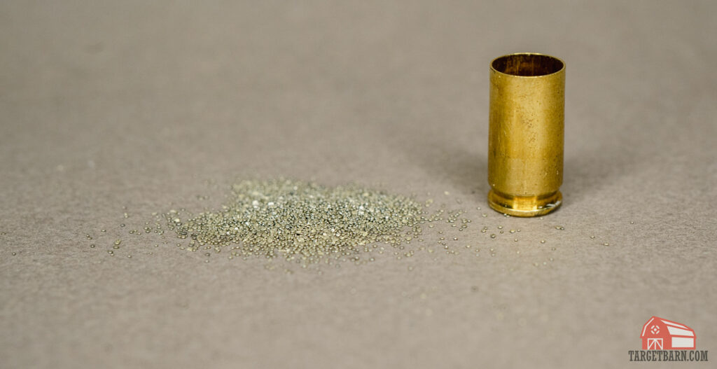 gunpowder next to a case that it would normally go in