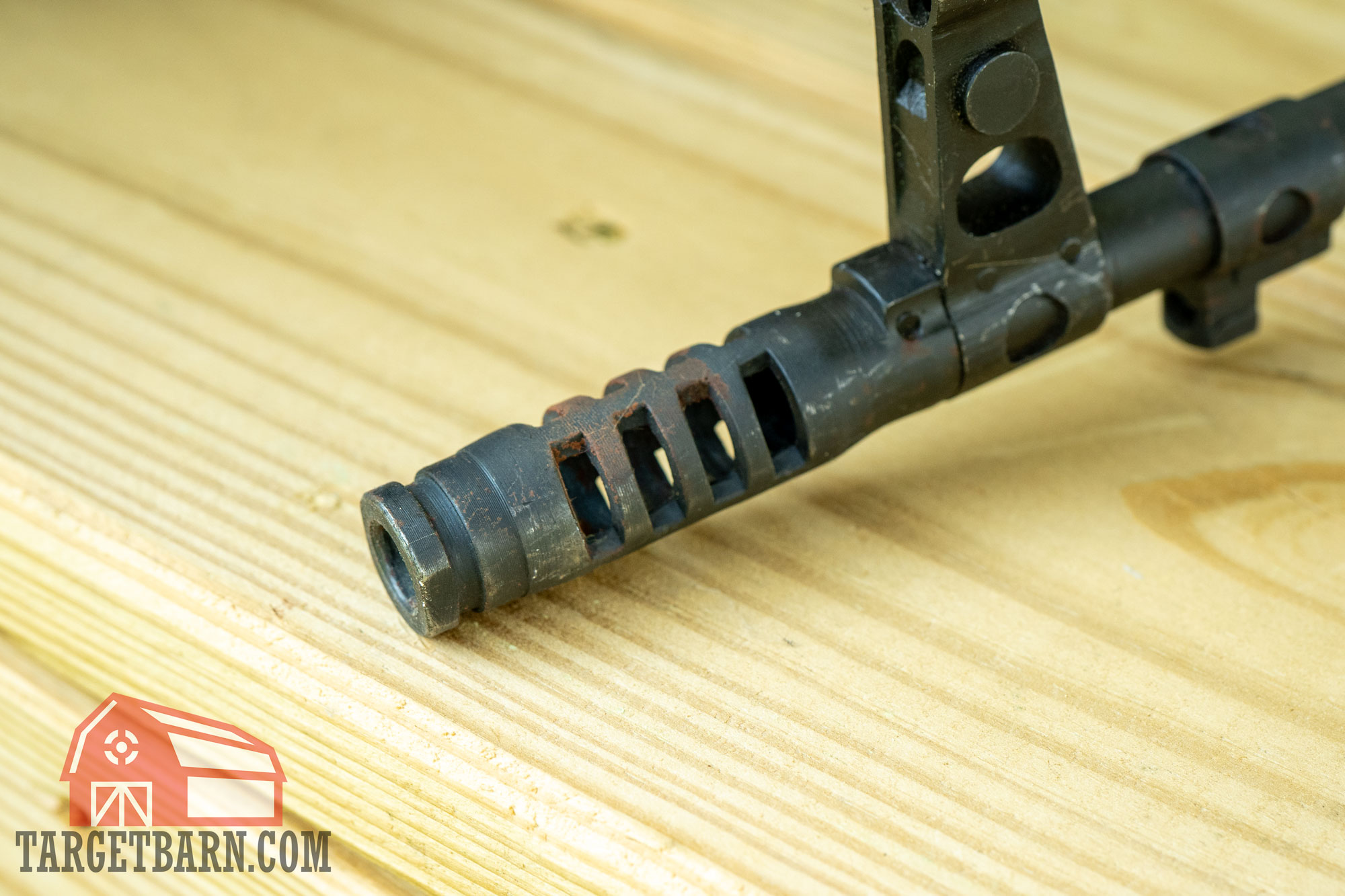 rust on the end of a rifle barrel