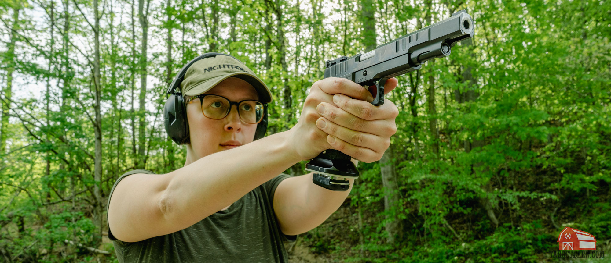 the author shooting a 2011 at the range