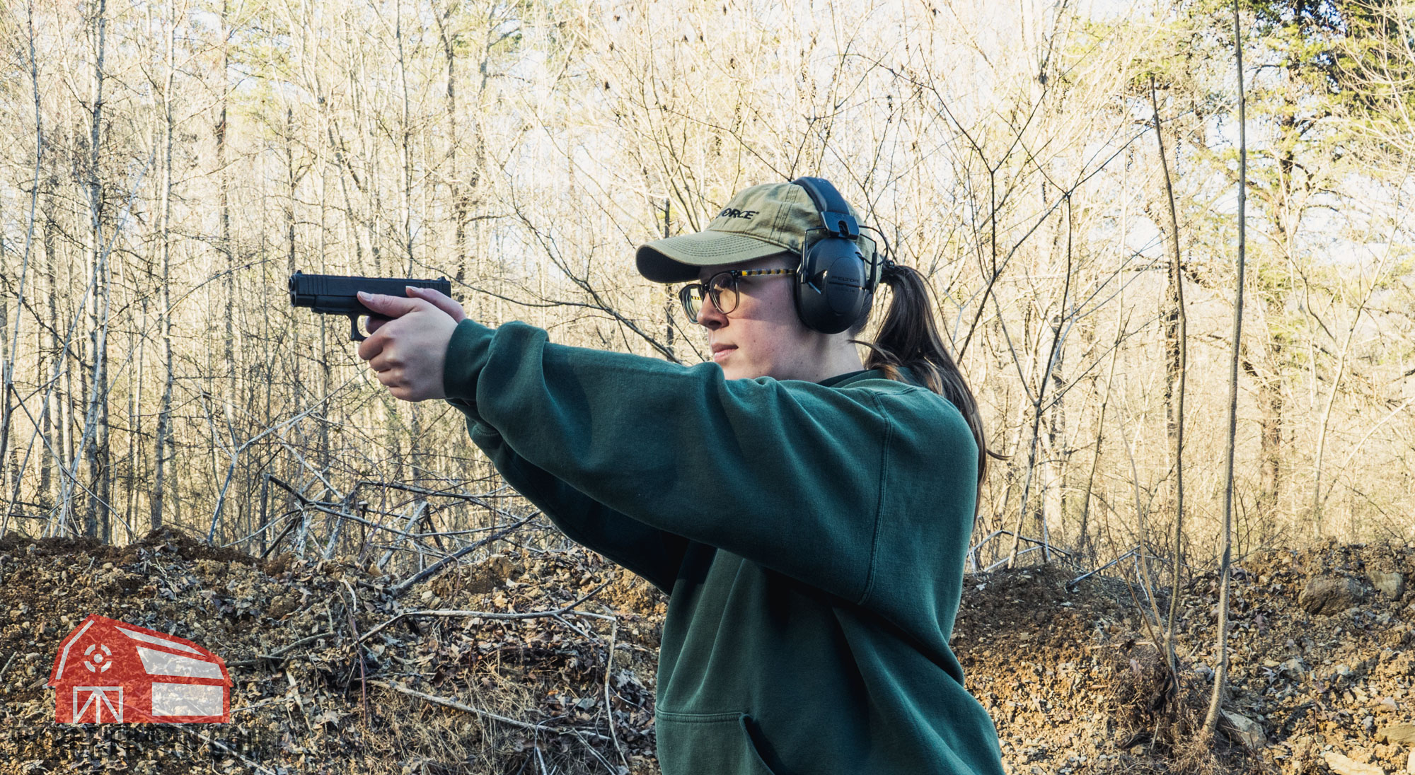 the author shooting a pistol loaded with critical defense ammo