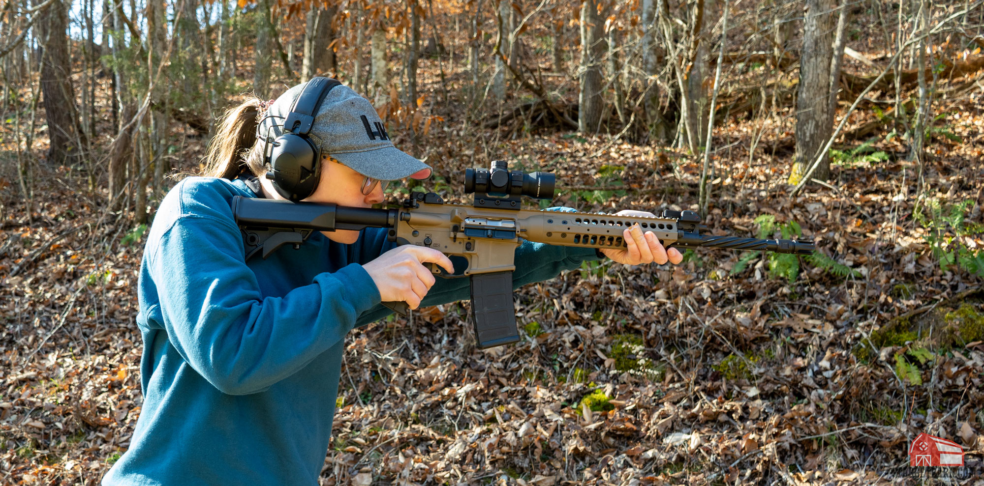 mckenzie shooting an ar-15 with a leupold red dot sight