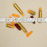 snap caps vs. dummy rounds header image showing loose dummy rounds and snap caps