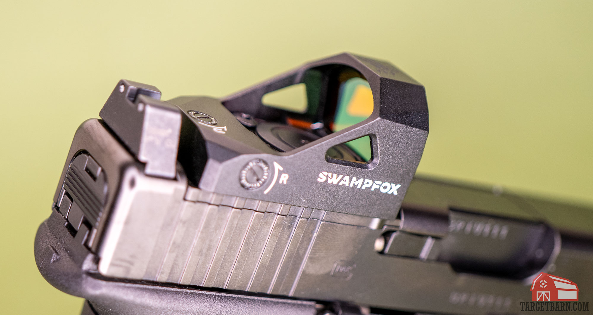 a swampfox justice mounted on a glock