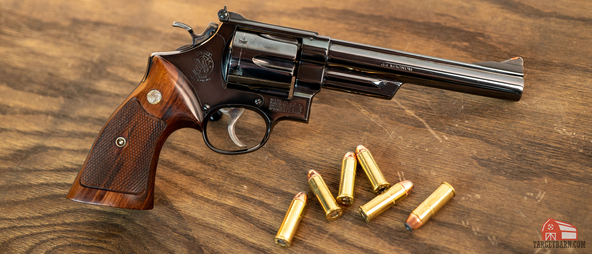 a smith and wesson model 29 revolver with 44 magnum ammo