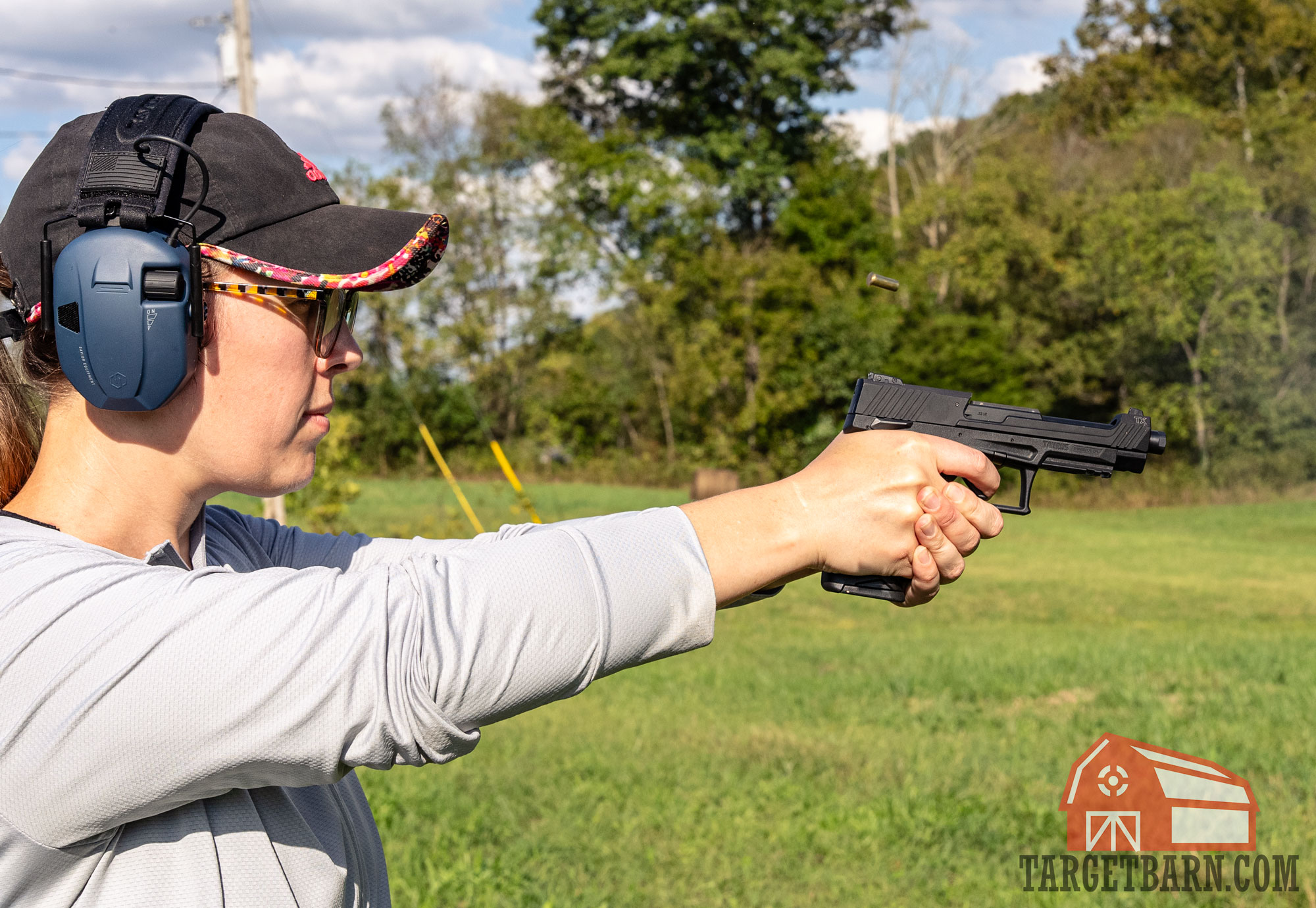 shooting blazer 22lr a woman shooting a taurustx 22 pistol at the range