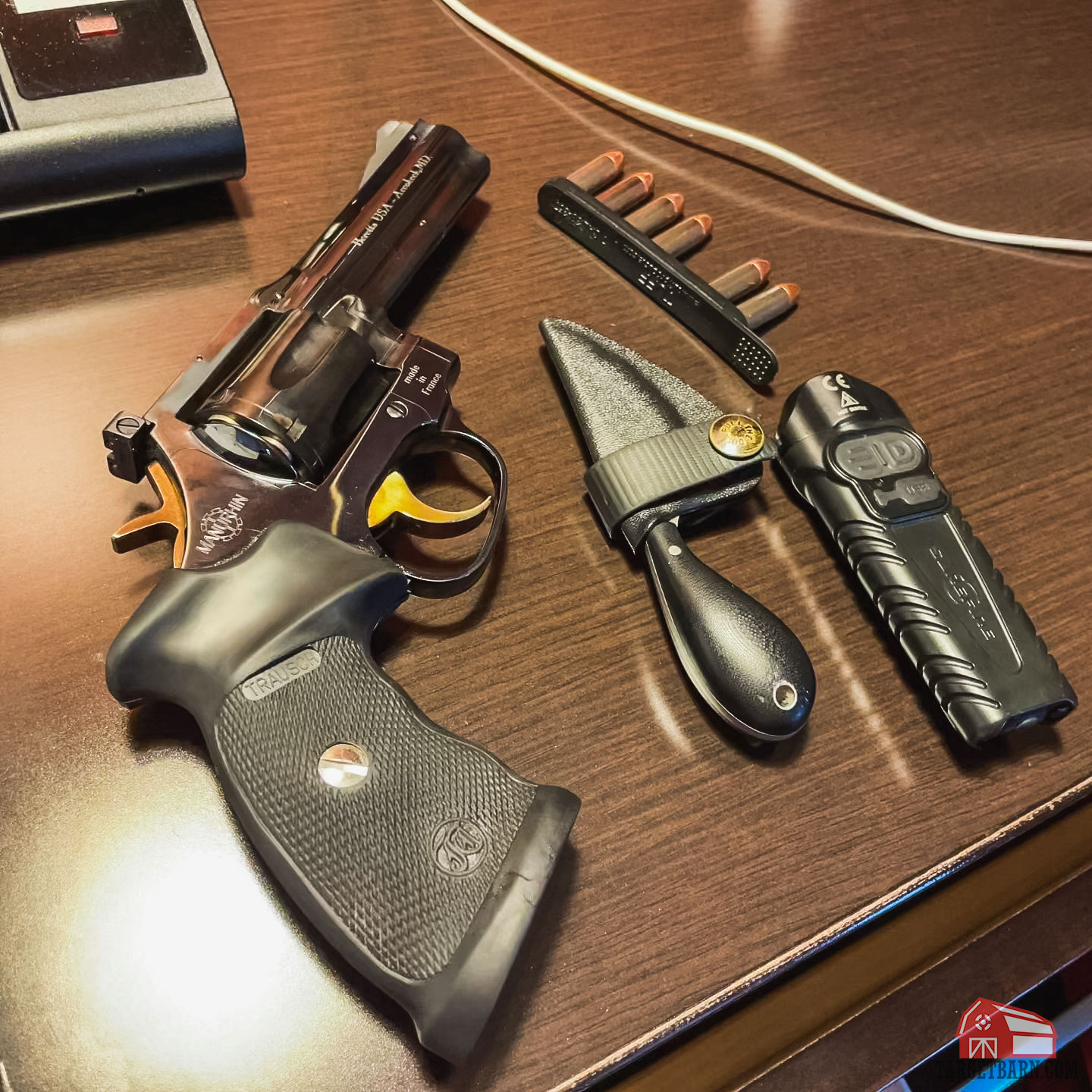 the manurhin mr73 on a nightstand
