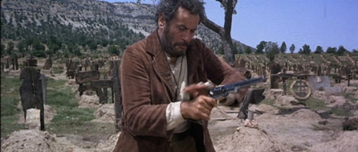 tuco from the good, the bad, and the ugly shooting a single action revolver