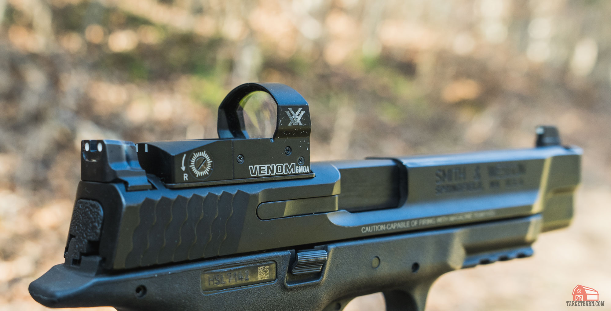 a vorrtex venom red dot optic mounted on a smith & wesson