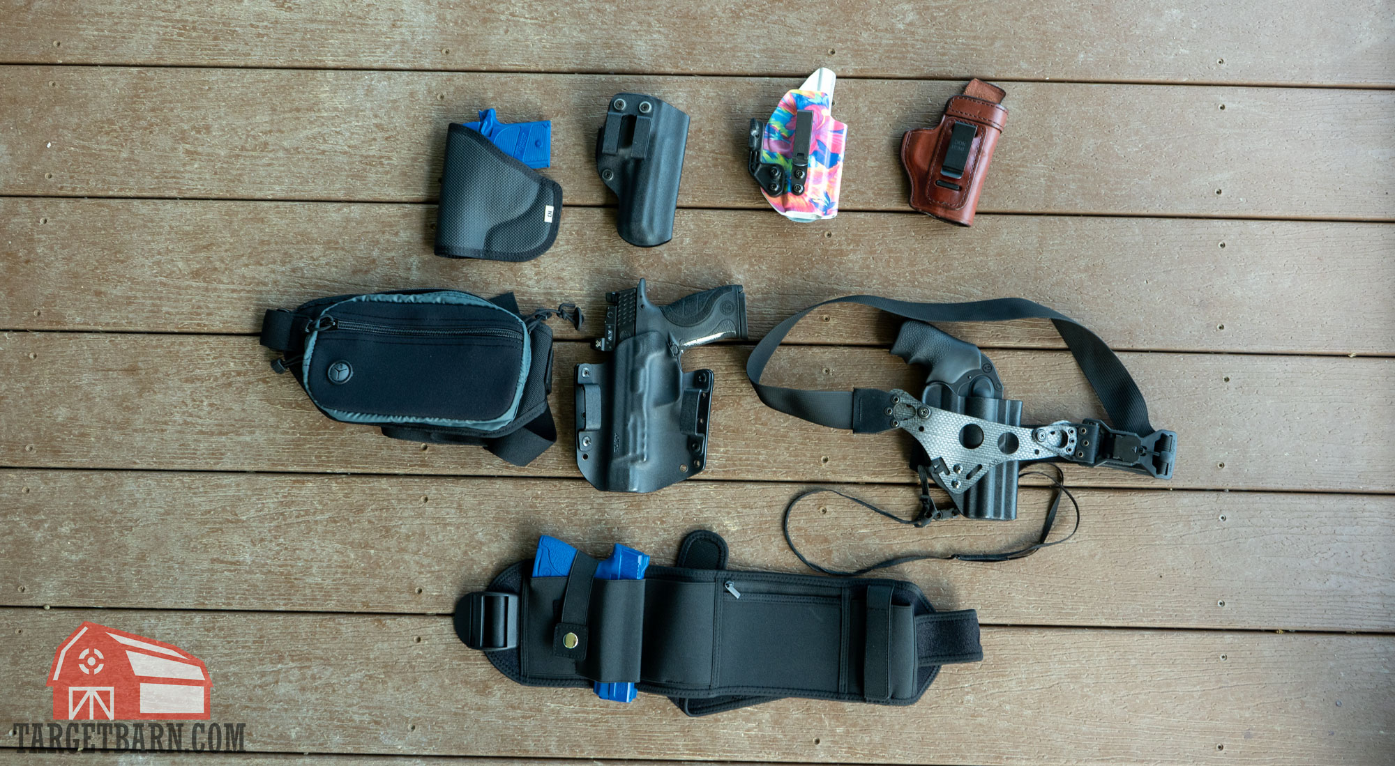several different types of holsters, including a phlster enigma, belly band, and fanny pack showing the different ways to conceal carry