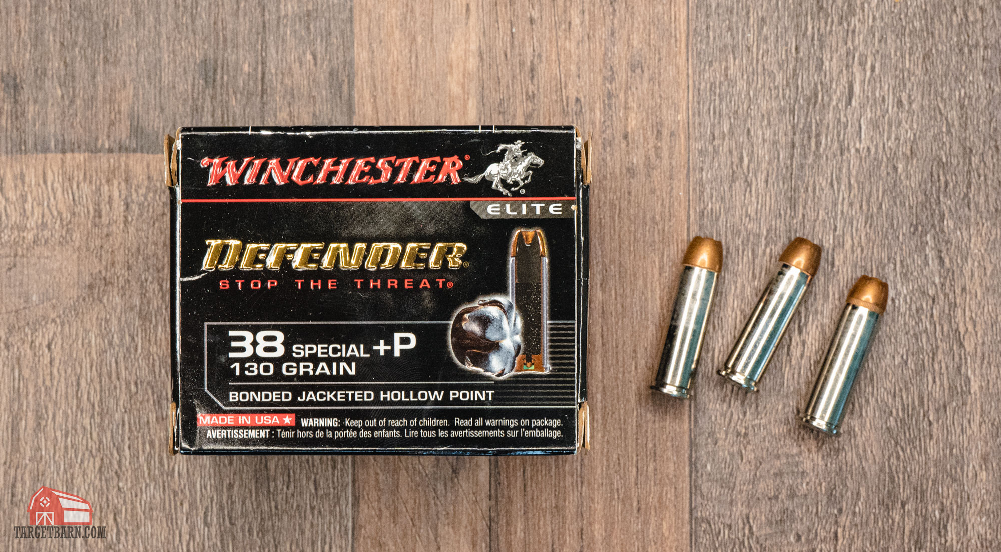a box and three rounds of winchester defender 38 special +p ammo