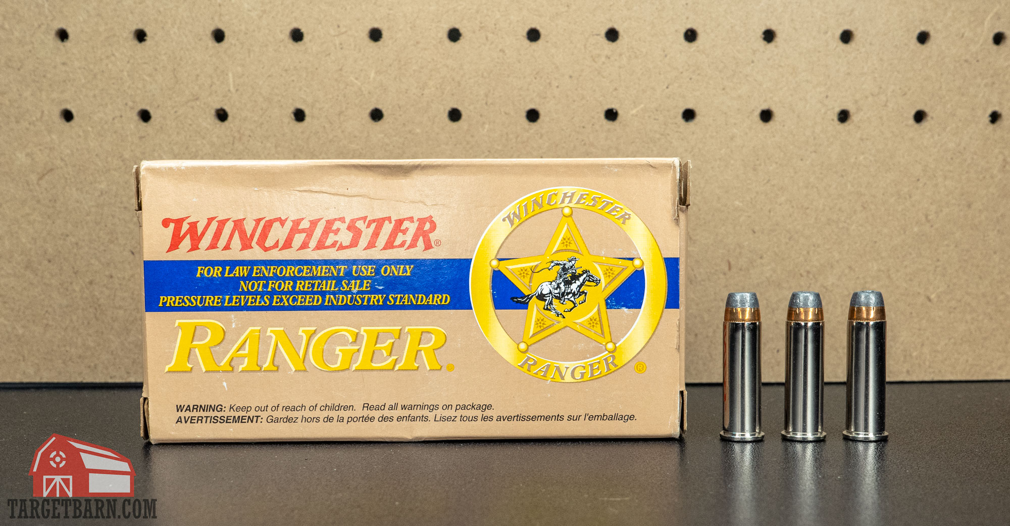 a box and three rounds of winchester ranger 38 special jhp ammo