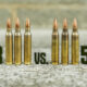 223 ammunition vs 5.56 ammunition displayed at a shooting range